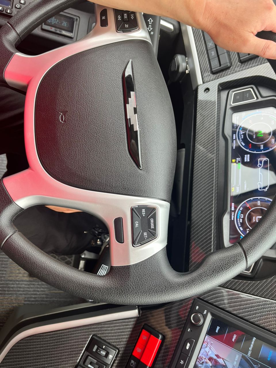 Electric bus driver cockpit with digital cluster and reversing camera