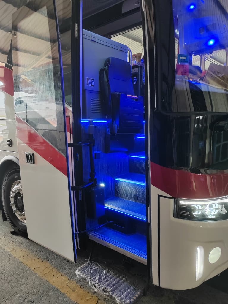 Front entrance with blue LED-lit steps and guide seat