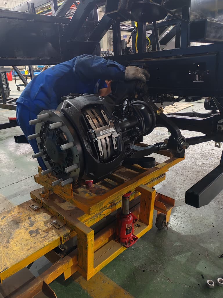 Wheel hub and brake assembly on assembly trolley